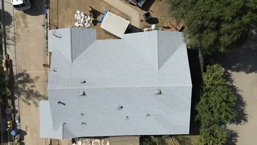 Aerial of new gray architectural shingle roof