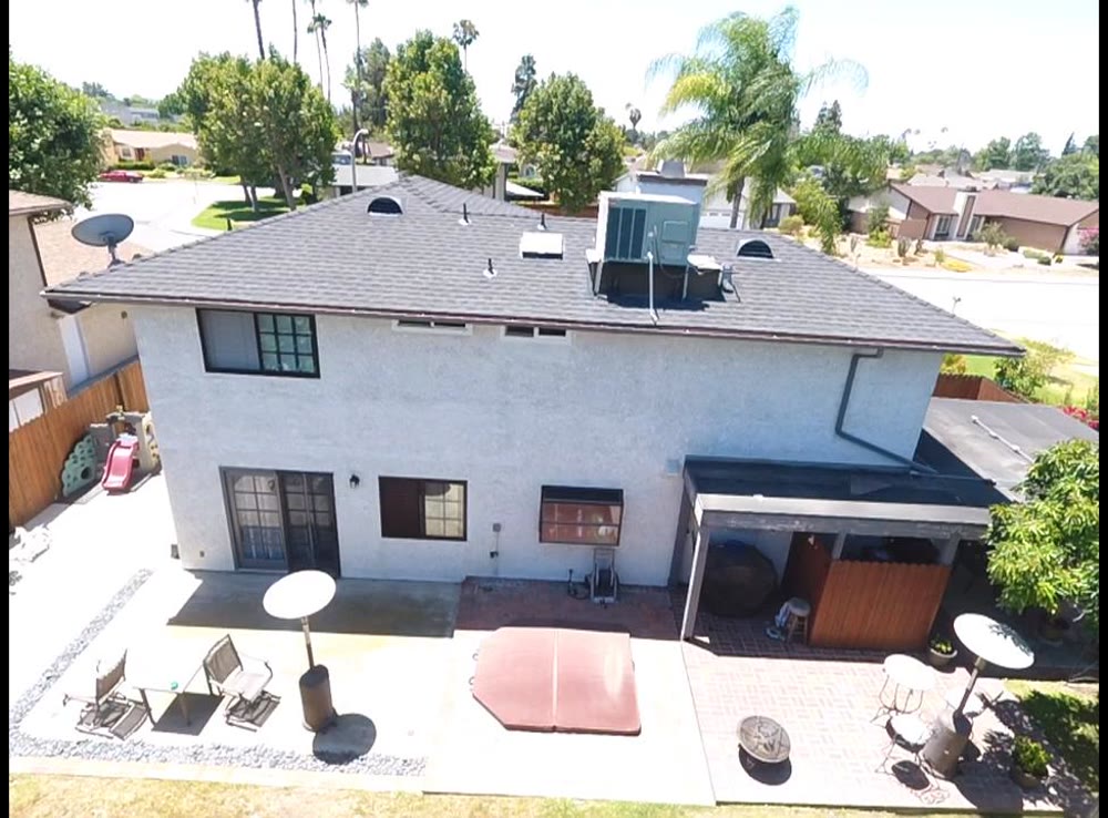 Finished home exterior with new roof